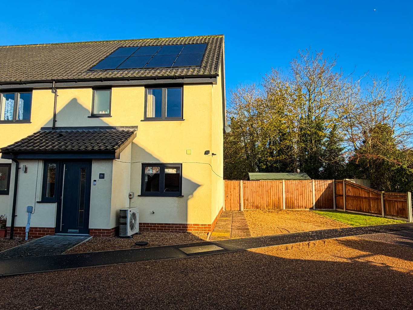 A Modern Two-Bedroom End Terrace of 3, Located in Convenient Non Estate Village Cul-De-Sac Position.